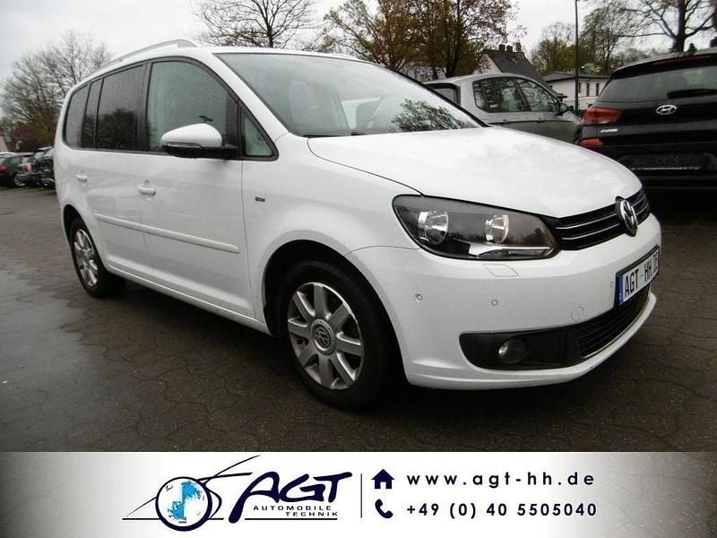 Second-hand VW Touran Cup 105 CP (77 kW) 2014 Alb Monovolum