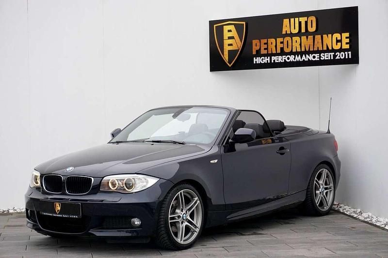 Carbonschwarz metallic Gebraucht 2013 BMW 118 Cabriolet M Sport Cabrio | 16.800 € - Bild 1/4