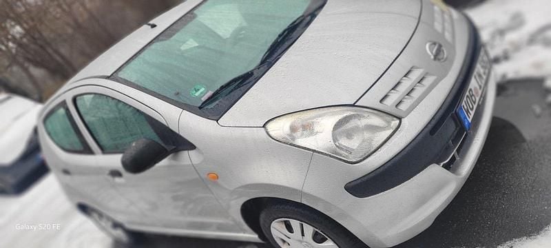 Gebraucht Nissan Pixo 68 PS (50 kW) 2011 Silber Kleinwagen