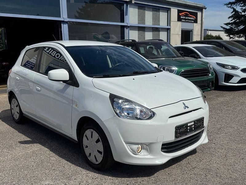 Weiß Gebraucht 2015 Mitsubishi Space Star Top Kleinwagen | 4.300 € (Fairer Preis) - Bild 1/4