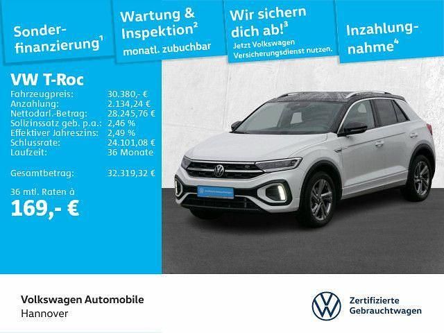 Pure white/schwarz Gebraucht 2025 VW T-Roc R-line SUV | 29.770 € (Superpreis) - Bild 1/3