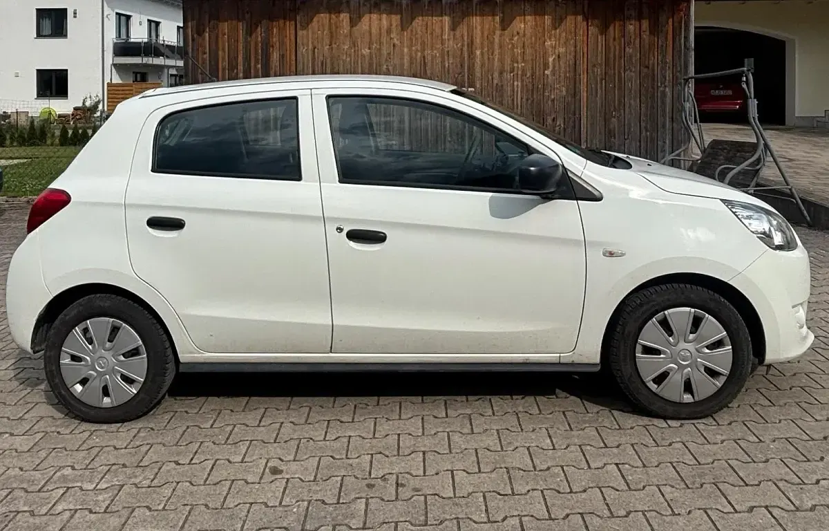Gebraucht Mitsubishi Space Star 75 PS (55 kW) 2015 Weiß Kleinwagen