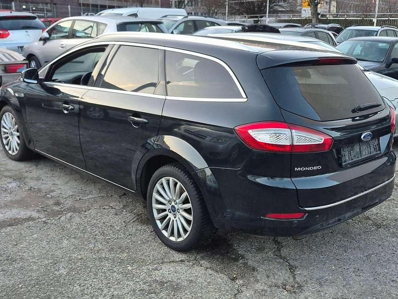 Gebraucht Ford Mondeo Titanium 160 PS (117 kW) 2013 Pantherschwarz metallic Kombi