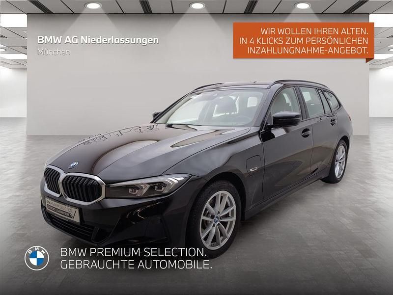 Schwarz Gebraucht 2022 BMW 320e Kombi | 31.301 € (Fairer Preis) - Bild 1/4