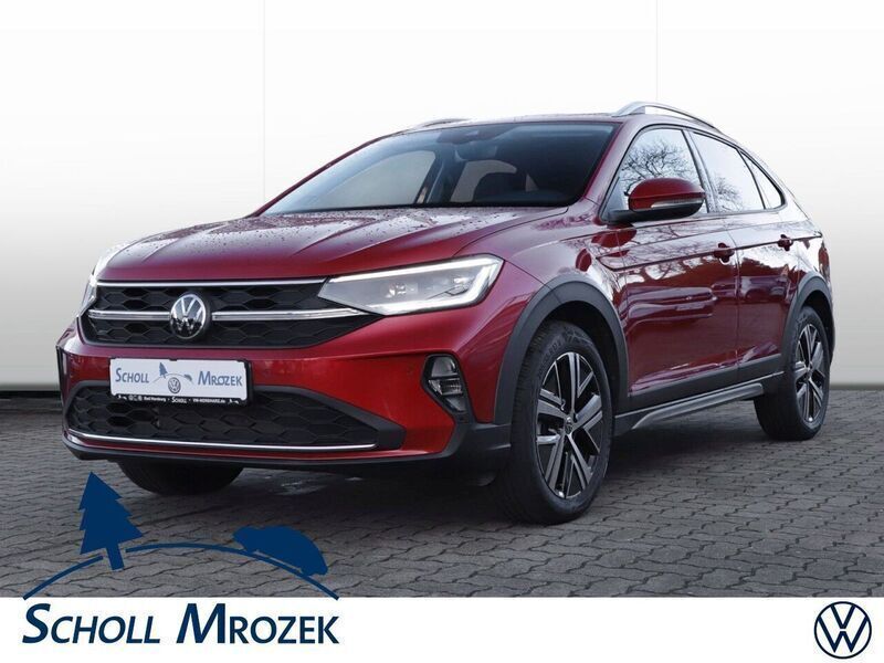 Kings red (metallic) Gebraucht 2022 VW Taigo Style SUV | 22.990 € (Fairer Preis) - Bild 1/4