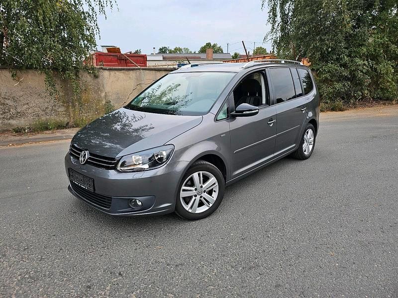 Grau Gebraucht 2012 VW Touran Van / Kleinbus | 5.999 € (Fairer Preis) - Bild 1/4