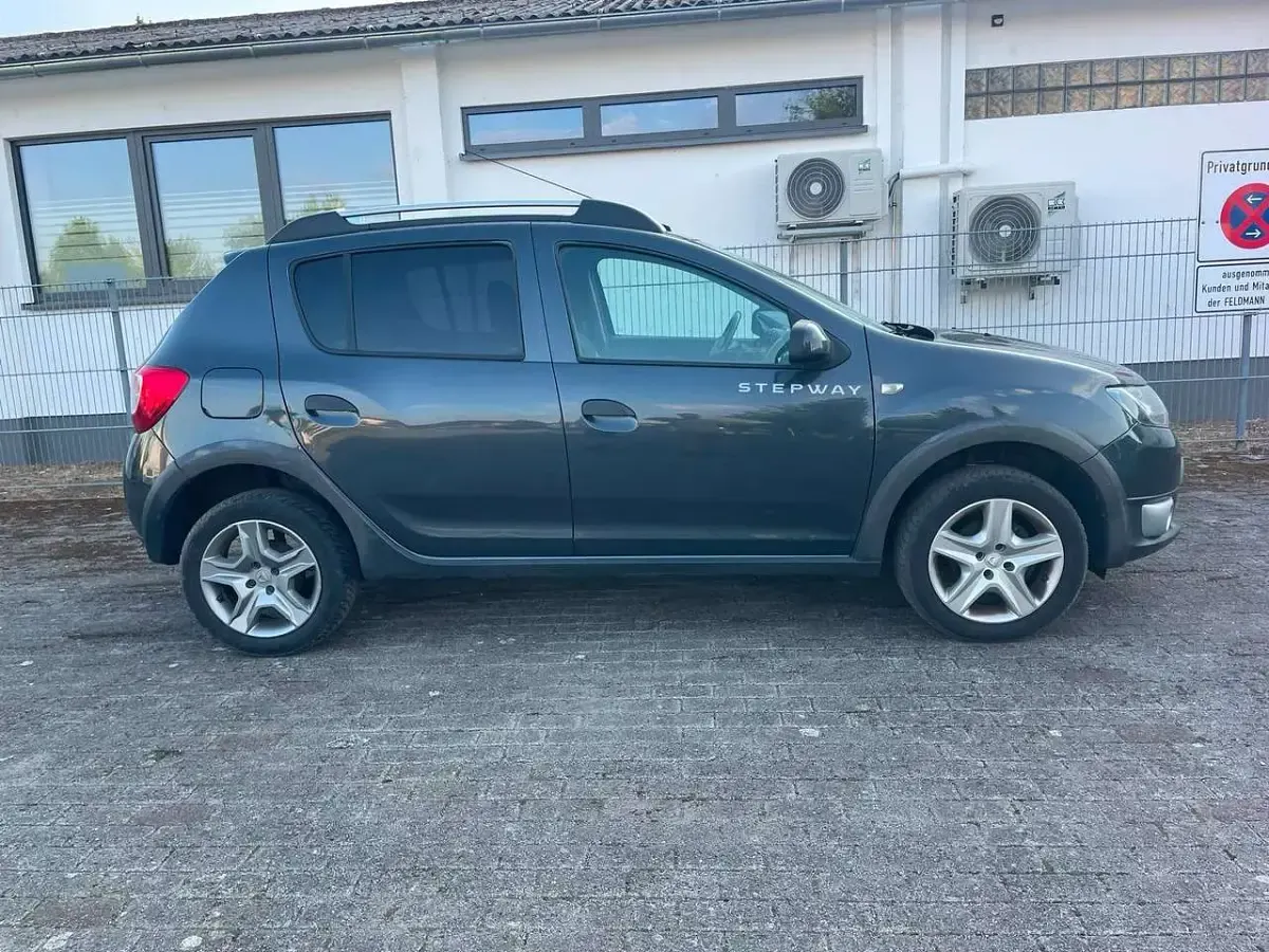 Gebraucht Dacia Sandero Prestige 90 PS (66 kW) 2016 Grau "comete" Kleinwagen