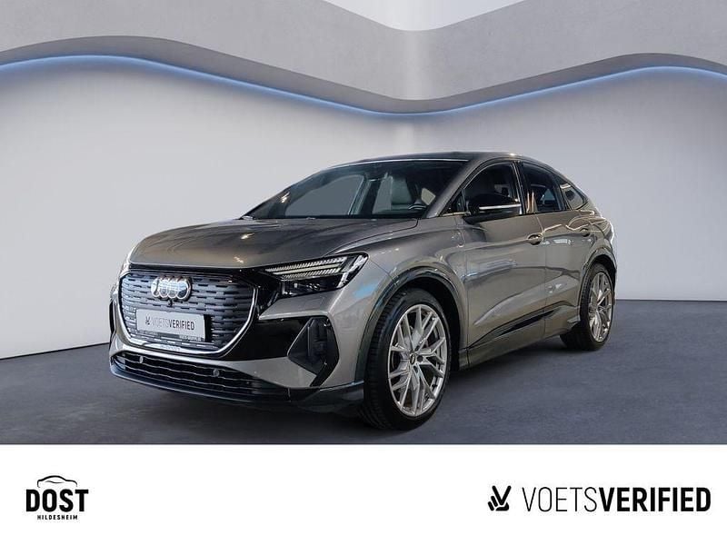 Taifungrau metallic Gebraucht 2022 Audi Q4 Sportback e-tron Sport SUV | 32.460 € (Fairer Preis) - Bild 1/4