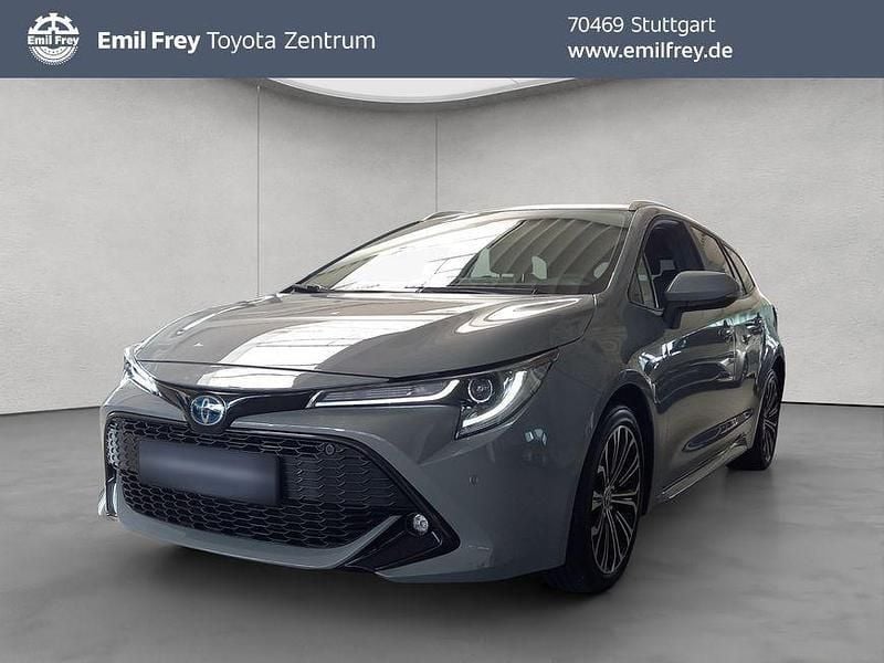 Manhattangrau metallic Gebraucht 2021 Toyota Corolla Team Kombi | 23.450 € (Fairer Preis) - Bild 1/4