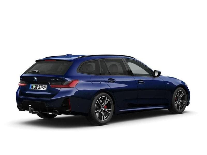 Gebraucht BMW 330e Shadowline 292 PS (214 kW) 2025 Tansanitblau ii (blau) Kombi