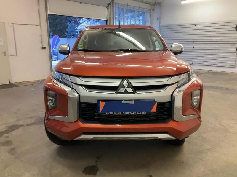 Gebraucht Mitsubishi L200 Top 150 PS (110 kW) 2022 Zirkonorange (metallic) Abholung