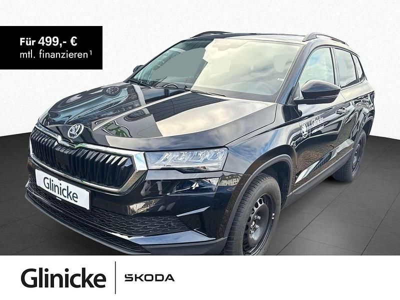 Schwarz Gebraucht 2024 Skoda Karoq Selection SUV | 35.390 € (Etwas zu teuer) - Bild 1/4