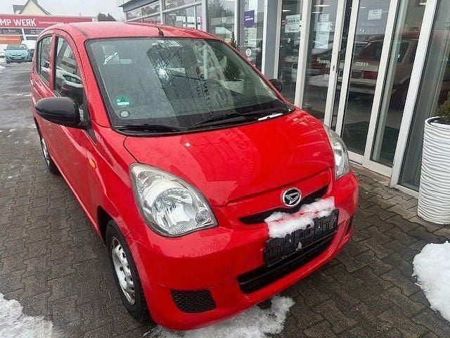 Gebraucht Daihatsu Cuore 69 PS (50 kW) 2009 Rot Kleinwagen