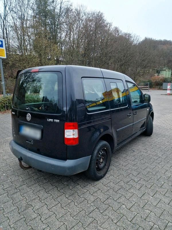Używany VW Caddy Life 105 KM (77 kW) 2004 Czarny Minivan