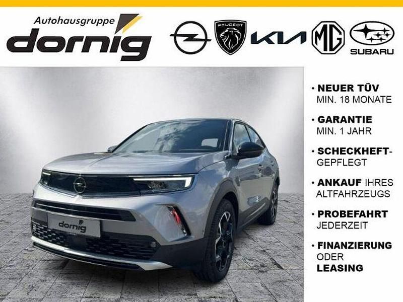 Gebraucht Opel Mokka-e Ultimate 100 kW (136 PS) 2022 Quarz silber (metallic) SUV