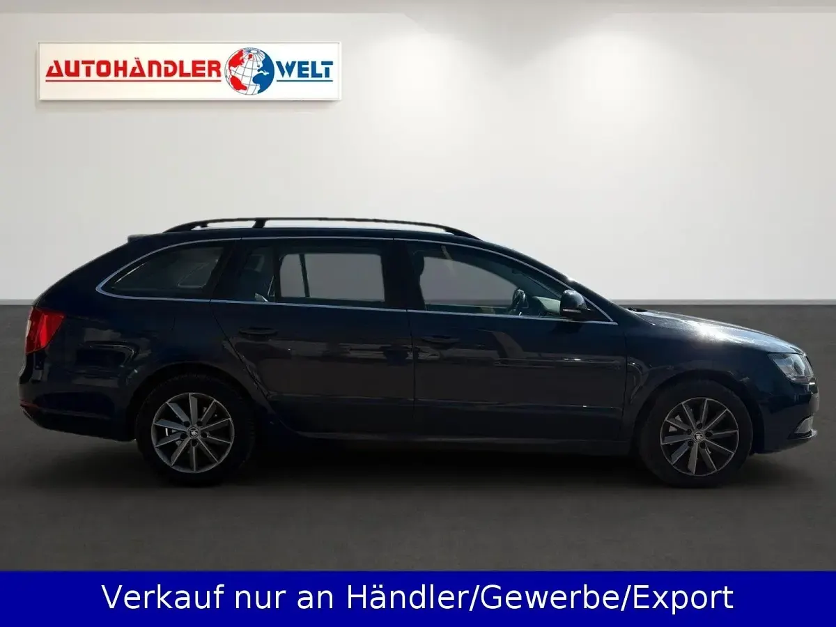 Używany Skoda Superb 105 KM (77 kW) 2014 Niebieski Kombi