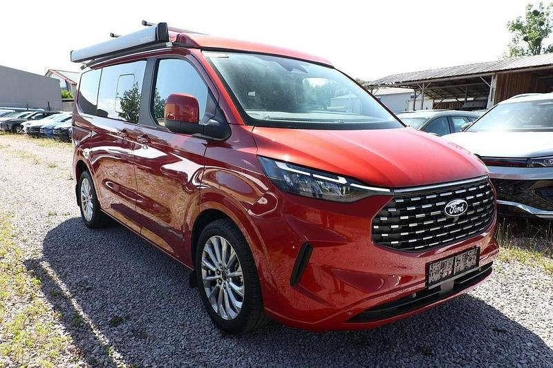 Artisan red metallic Neu 2025 Ford Tourneo Custom Nugget Van / Kleinbus | 64.110 € (Superpreis) - Bild 1/4