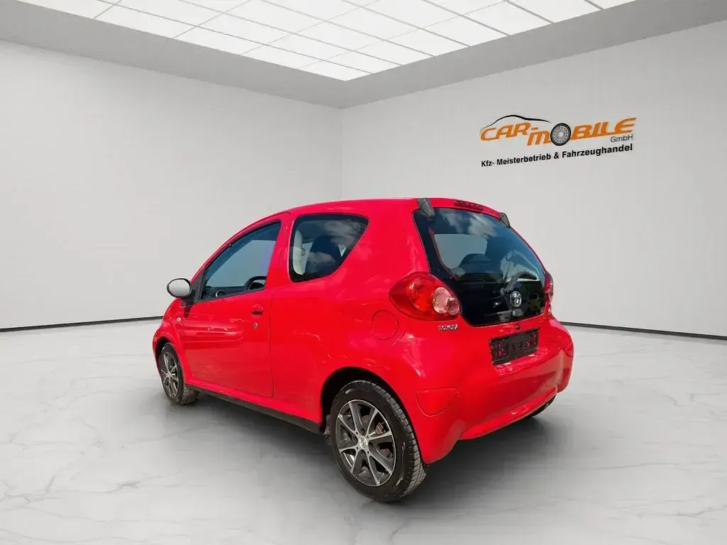 Gebraucht Toyota Aygo Cool 68 PS (50 kW) 2007 Rot Kleinwagen