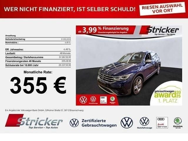 Atlantic blue metallic (metallic) Gebraucht 2021 VW Tiguan Allspace Elegance SUV | 31.950 € (Superpreis) - Bild 1/3