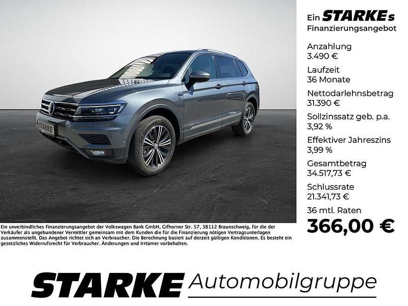 Grau (platinum grey metallic) Gebraucht 2021 VW Tiguan Allspace Highline SUV | 34.880 € (Fairer Preis) - Bild 1/4