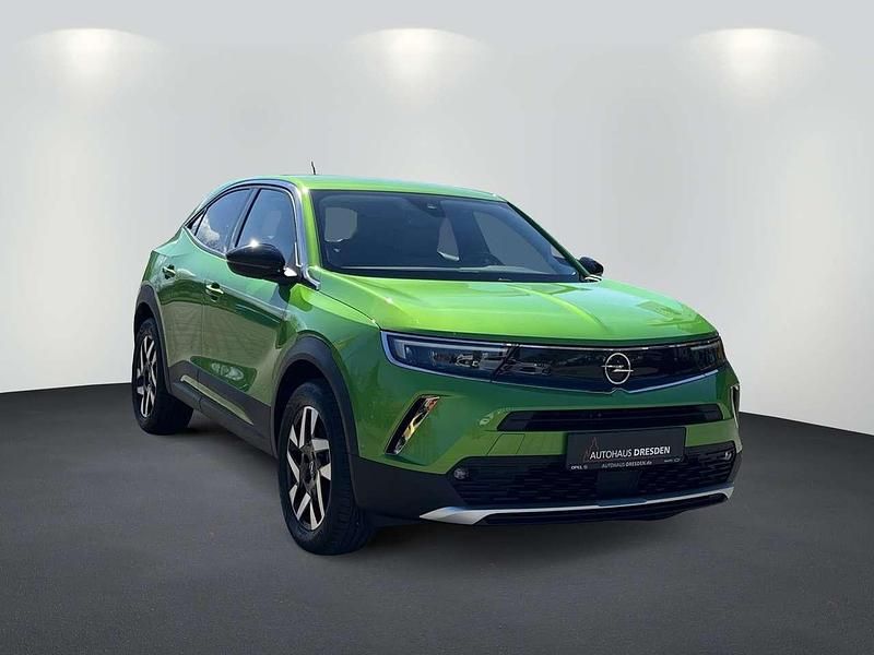Gebraucht Opel Mokka-e Elegance 100 kW (136 PS) 2022 Matcha green (metallic) SUV