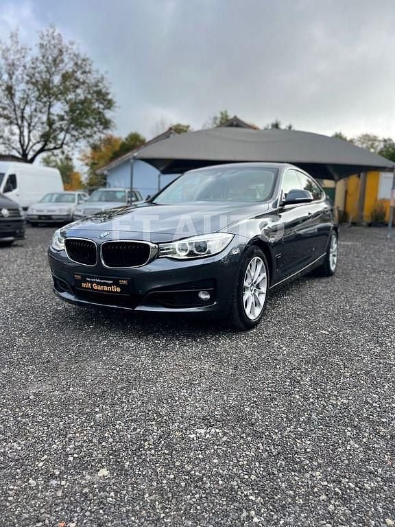 Grau Gebraucht 2014 BMW 335 Gran Turismo Sport Line Limousine | 13.900 € (Fairer Preis) - Bild 1/4