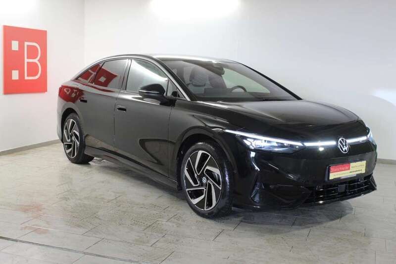 Schwarz (grenadillschwarz metallic) Gebraucht 2023 VW ID.7 Pro Kleinwagen | 50.765 € (Teuer) - Bild 1/4