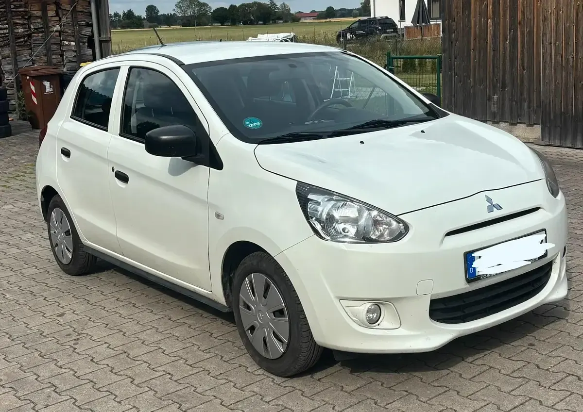 Gebraucht Mitsubishi Space Star 75 PS (55 kW) 2015 Weiß Kleinwagen
