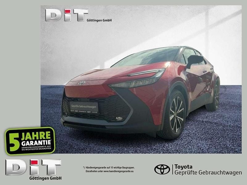 Karminarot met. / schwarzes da Gebraucht 2024 Toyota C-HR Team SUV | 26.490 € (Superpreis) - Bild 1/4