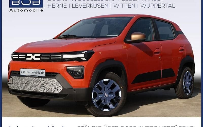 Brick red Gebraucht 2024 Dacia Spring Extreme Kleinwagen | 16.666 € (Fairer Preis) - Bild 1/4