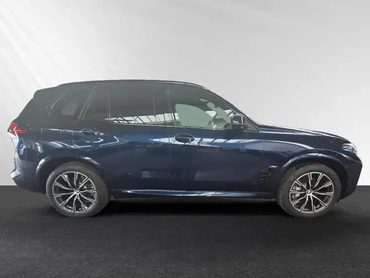 Gebraucht BMW X5 M Sport 381 PS (280 kW) 2024 Bmw individual tansanitblau metallic SUV