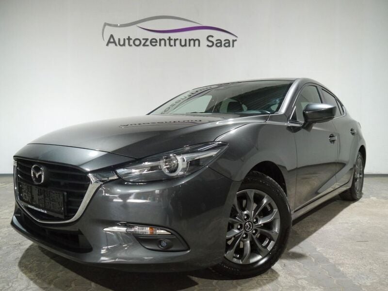 Grau Gebraucht 2017 Mazda 3 Exclusive-Line Limousine | 11.480 € (Guter Preis) - Bild 1/4