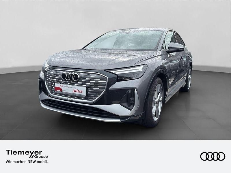 Taifungrau metallic Gebraucht 2022 Audi Q4 Sportback e-tron Ambiente SUV | 31.860 € (Fairer Preis) - Bild 1/4