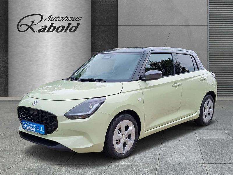 Cool yellow / mineral gray (gelb) Gebraucht 2025 Suzuki Swift Comfort Kleinwagen | 19.990 € (Teuer) - Bild 1/4