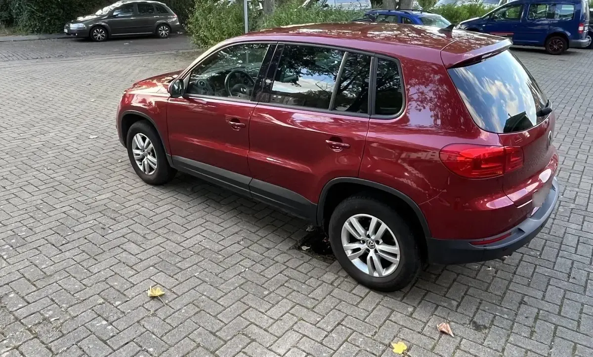 Używany VW Tiguan 122 KM (89 kW) 2012 Czerwony SUV