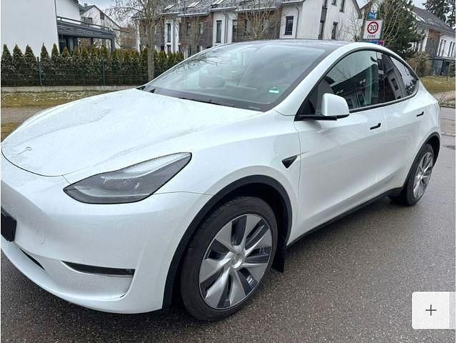 Gebraucht Tesla Model Y Long Range AWD 378 kW (514 PS) 2023 Sonderlackierung perlweiß SUV