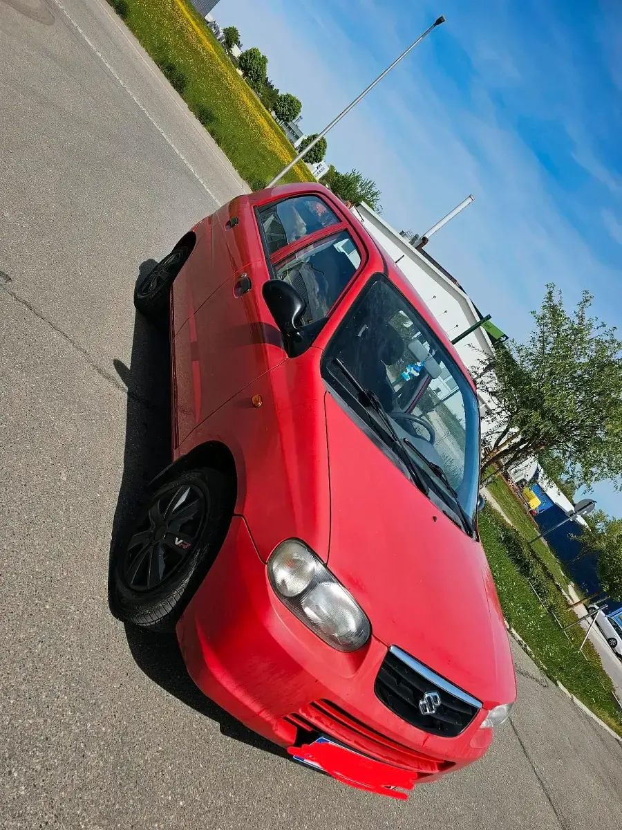 Usata Suzuki Alto 62 CV (45 kW) 2004 Rosso Utilitaria