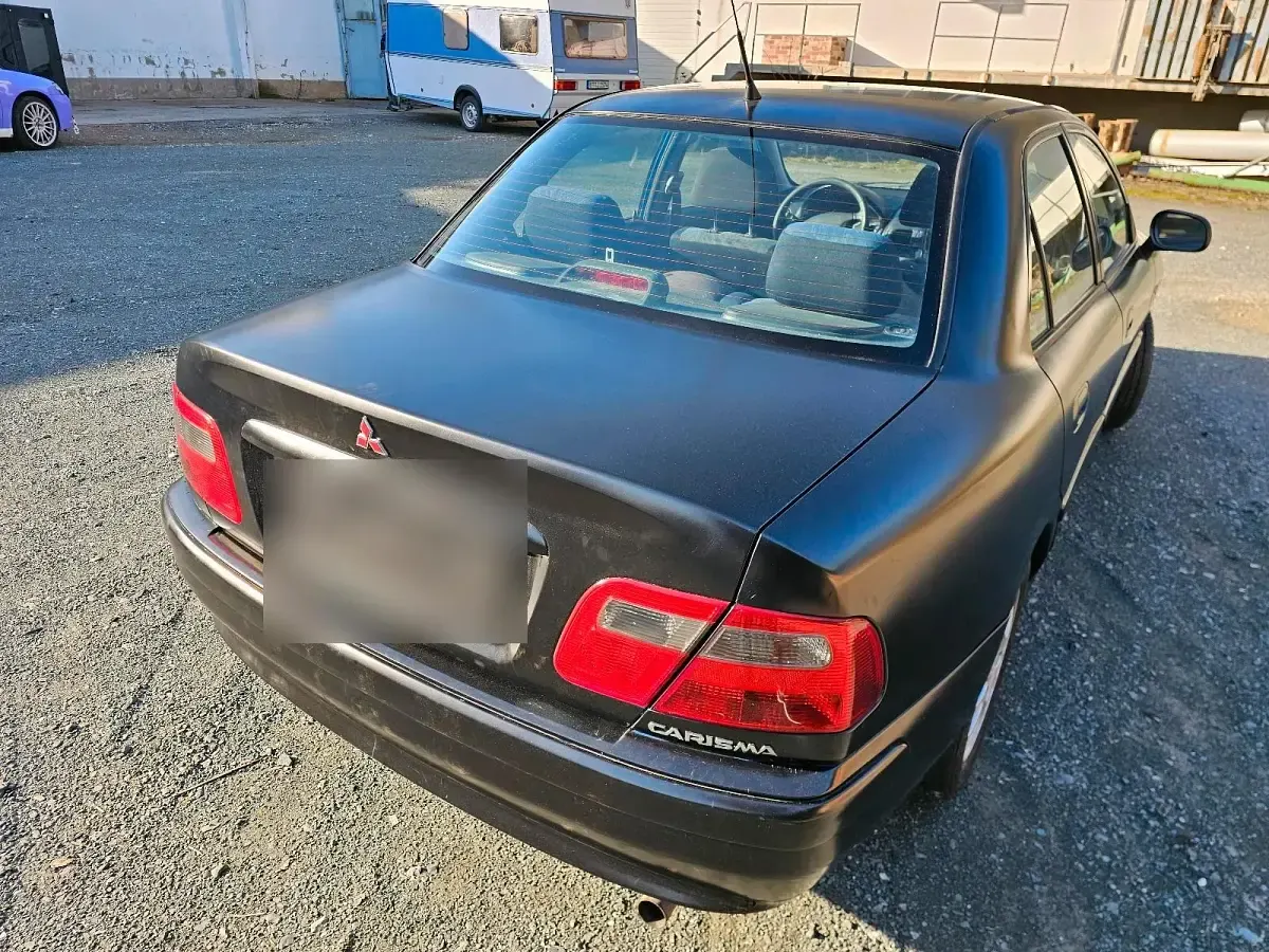 Gebraucht Mitsubishi Carisma 100 PS (73 kW) 2001 Schwarz Limousine