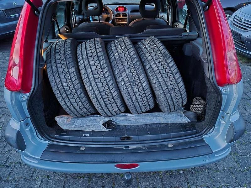 Gebraucht Peugeot 206 Tendance 109 PS (80 kW) 2003 Farbe islandgrau/metallic Kombi