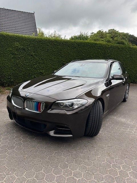 Braun Gebraucht 2014 BMW M550 Sport Line Limousine | 25.550 € (Fairer Preis) - Bild 1/4