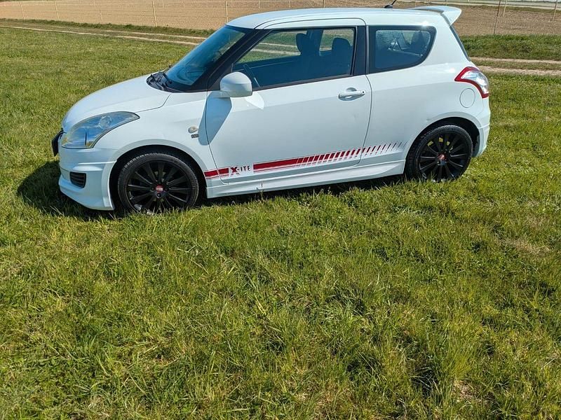 Second-hand Suzuki Swift 94 CP (69 kW) 2012 Alb Hatchback