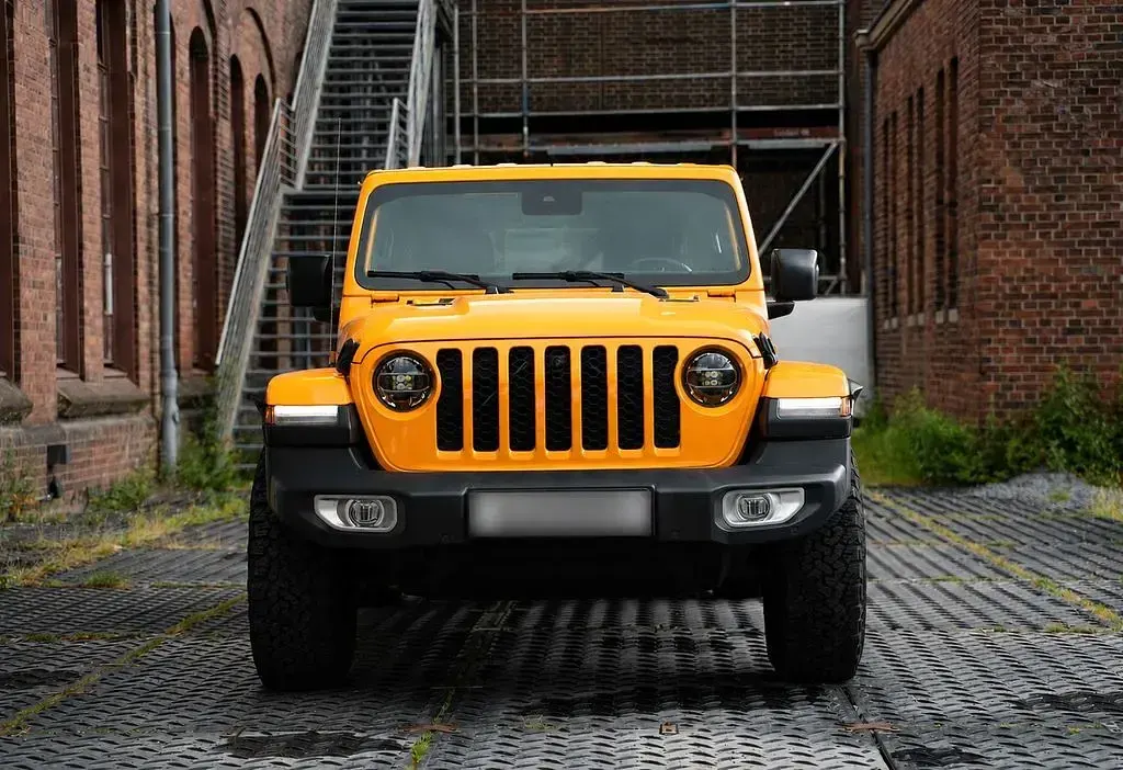 Gebraucht Jeep Wrangler Sahara 272 PS (200 kW) 2021 Orange SUV