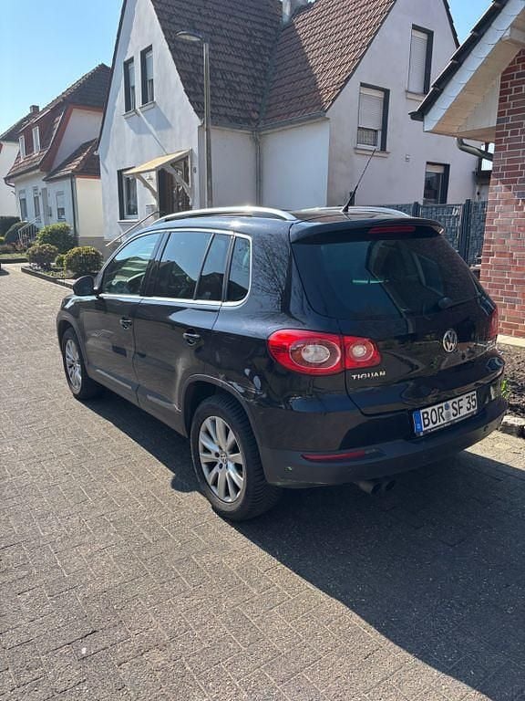 Gebraucht VW Tiguan Team 140 PS (102 kW) 2011 Schwarz SUV