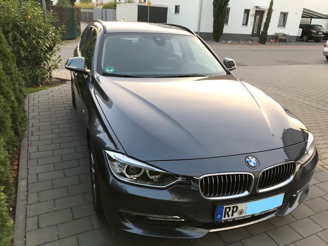 Grau metallic Gebraucht 2014 BMW 320 Luxury Line Kombi | 24.700 € - Bild 1/4
