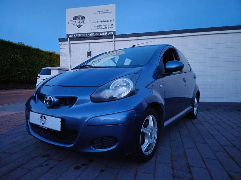 Graphitblau Gebraucht 2009 Toyota Aygo Cool Kleinwagen | 2.300 € (Fairer Preis) - Bild 1/4