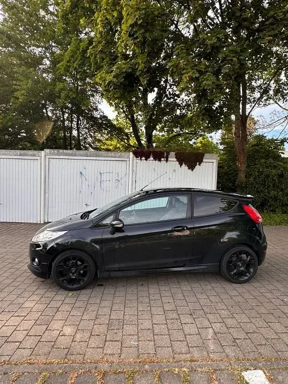 Używany Ford Fiesta S 135 KM (99 kW) 2012 Czarny Sedan/Limuzyna