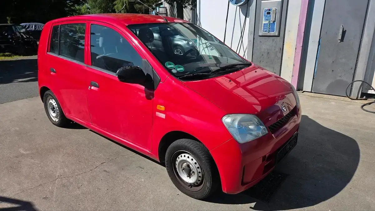 Gebraucht Daihatsu Cuore 58 PS (42 kW) 2003 Rot Kleinwagen