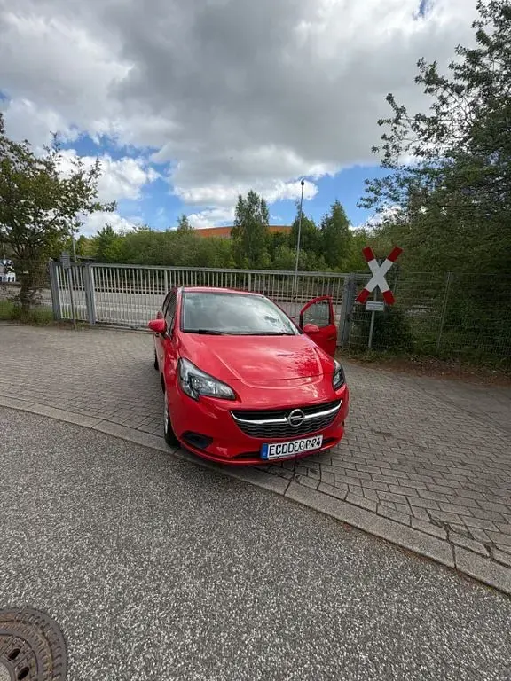 Usado Opel Corsa Selection 69 HP (50 kW) 2017 Vermelho Citadino