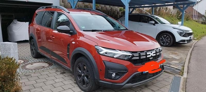 Braun Gebraucht 2023 Dacia Jogger Extreme Van / Kleinbus | 18.400 € (Fairer Preis) - Bild 1/4