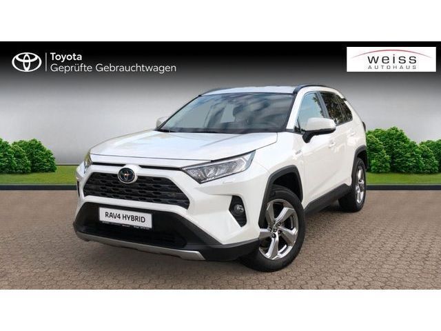 Schneeweiß Gebraucht 2024 Toyota RAV4 Hybrid Team SUV | 39.890 € (Guter Preis) - Bild 1/4